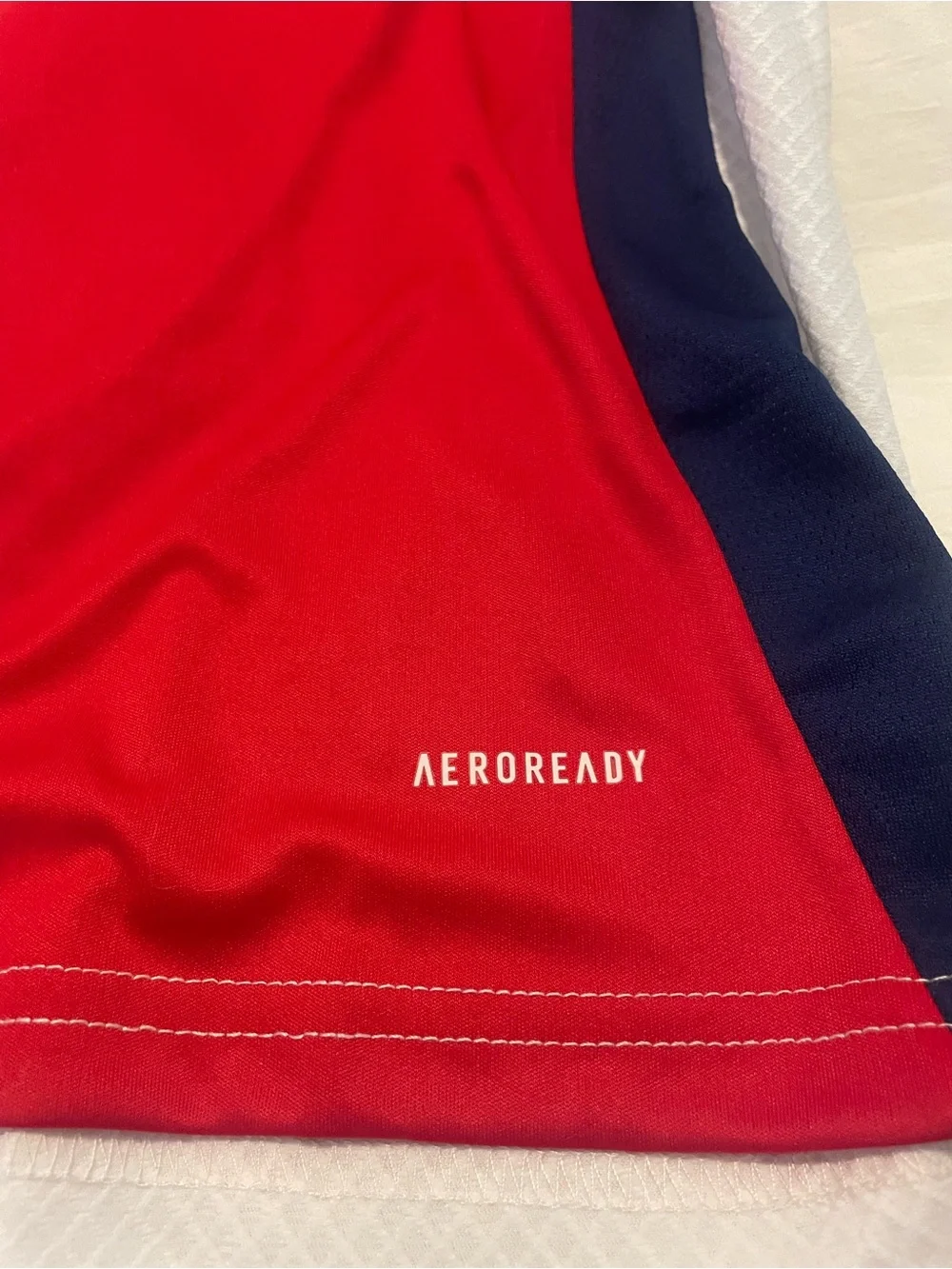 Adidas Red and White Arsenal Football Jersey with navy accents.